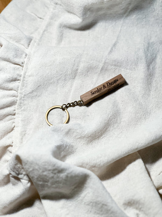 Houten sleutelhanger met 4 zijden gravure